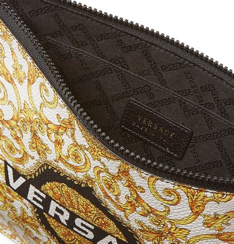 versace printed full-grain leather pouch|versace leather handbags.